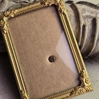 messing-fotoramme-flotte-lilje-hjoerner-vintage-billedramme